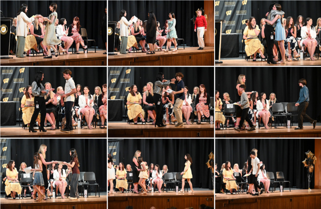 students receiving awards on stage